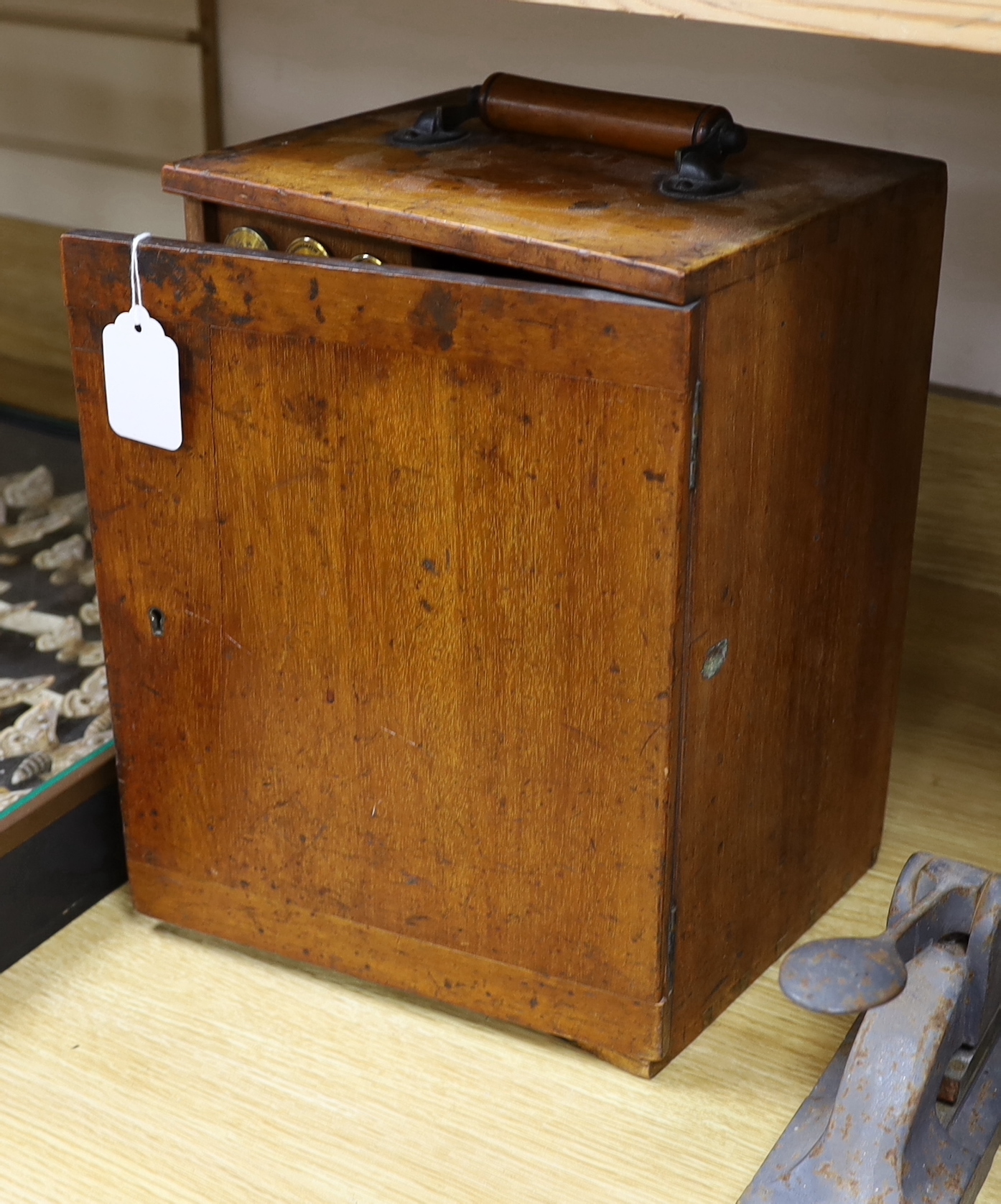 A Victorian monocular brass and black enamel microscope by W. Watson & Sons, High Holborn, in a mahogany carrying case, Serial no.19919, with a number of alternative lens of different magnification, case 34.5cm high
